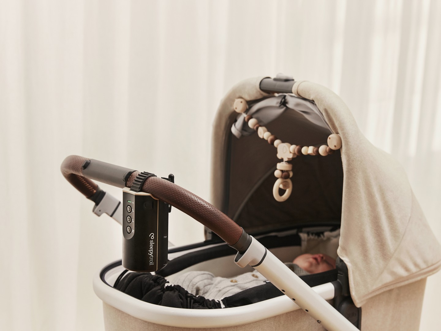 Baby in a Cradle with digital device